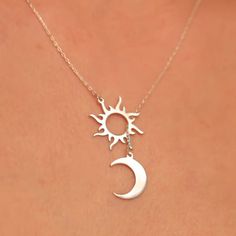 Looking for a unique and meaningful piece of jewelry? Our Sun and Moon Harmony Necklace embodies both balance and beauty, making it a perfect addition to any jewelry collection. Crafted with high-quality materials and expert attention to detail, this necklace features a beautiful sun and moon design that symbolizes harmony and balance. The pendant is crafted with intricate details and hangs from a delicate chain, making it a perfect piece for layering or wearing on its own. This Sun and Moon Har Celestial Sun And Moon Sterling Silver Necklace, Sterling Silver Sun And Moon Spiritual Necklace, Spiritual Sterling Silver Sun And Moon Necklace, Sterling Silver Spiritual Necklace With Sun And Moon Design, Spiritual Sterling Silver Necklace With Sun And Moon Design, Sterling Silver Sun And Moon Design Jewelry, Everyday Sun And Moon Design Necklaces, Sterling Silver Moon Phase Charm Necklaces, Celestial Jewelry With Sun And Moon Designs