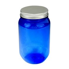 a blue glass jar with a silver lid