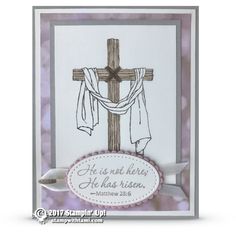 a card with a cross and ribbon on it