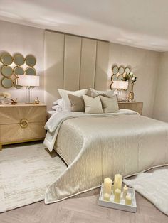 Neutral bedroom with tall headboards & gold accenting. This bedroom has two large wooden bedside tables with a sunburst effect and gold handles. Coastal Dorm, Apartment Girly, Beachy Bedroom, Bed Design Ideas, Luxe Bedroom, Ottoman Storage Bed, Tall Headboard, Velvet Headboard, Bed Design Modern