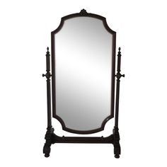 a large mirror sitting on top of a wooden stand