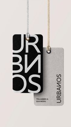 a black and white tag with the words urbanos hanging from it's side