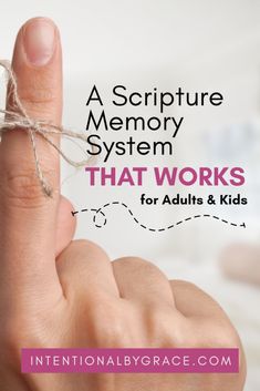 a hand holding a string with the words, a scripture memory system that works for adults and kids