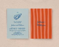 an orange and blue wedding card on a white wall