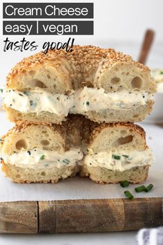 four bagels stacked on top of each other with cream cheese