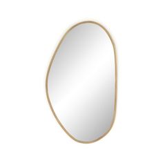 an oval shaped mirror on a white wall