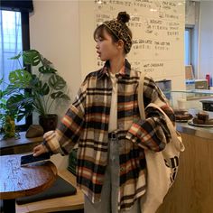 Harajuku Ulzzang Oversized Plaid Flannel Button Up Shirt SIZE INFO One Size - Bust 120cm/47.2", Length 77cm/30.3" NOTE: DUE TO VERY HIGH DEMAND, PLEASE ALLOW 12-20 DAYS FOR DELIVERY TO THE US, AND 20-45 DAYS TO THE REST OF THE WORLD. Trendy Winter Flannel Shirt, Trendy Winter Flannel Shirt With Buttons, Trendy Oversized Brown Shirt, Trendy Brown Shirt For Fall, Oversized Button-up Shirt For Fall, Oversized Long Sleeve Flannel Shirt With Buttons, Casual Fall Flannel Shirt With Buttons, Winter Oversized Button-up Shirt, Trendy Flannel Shirt For Fall