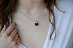 Large black onyx necklace. Elegant necklace. Please select your length. __ o n y x __ l o v e __ n e c k l a c e __ <3 ♥ This piece is handmade with 14k yellow gold filled chain and a single round 12 mm bezel pendant. ♥ You can select your size from the drop-down menu. The length includes the chain, pendant and the closure. The pictured necklace is 40 cm (16 inches) long. ♥ All pieces are handmade to order. I can make a piece that will satisfy your imagination, a personalized piece that will Black Jewelry With Adjustable Chain For Formal Occasions, Classic Black Jewelry As Gift, Classic Black Jewelry For Gift, Minimalist Black Necklace For Formal Events, Minimalist Black Necklace For Formal Occasions, Black Birthstone Necklace For Anniversary, Minimalist Onyx Jewelry For Anniversary, Elegant Everyday Jewelry With Black Enamel, Black Birthstone Necklaces For Anniversary