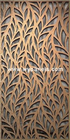 an intricate wooden panel with leaves on it