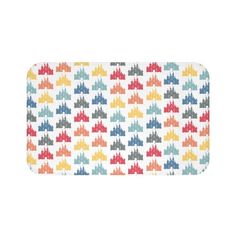 a bath mat with colorful airplanes printed on the front and back, all in different colors