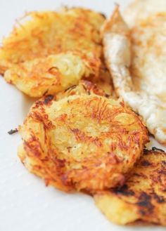 some fried food is on a white plate