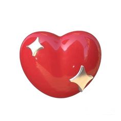 a large red heart with gold accents on it's sides and an arrow in the middle