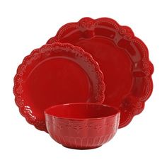 red dinnerware set on white background