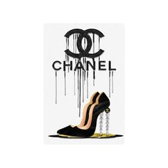 a pair of high heeled shoes with the word chanel on it's side