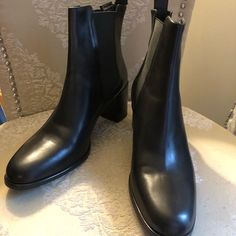 Brand New Quality Soft Leather Black Boots. Euro Size 40 Equivalent To Us Size 10. Casual Leather Heeled Boots With Padded Heel, Classic Black Ankle-high Heeled Boots, Faux Leather Chelsea Boots For Work, Black Chelsea Boots With Reinforced Heel For Office, Classic Black Boots With Padded Heel, Chic Chelsea Boots With Round Toe For Office, Black Chelsea Boots For Formal Fall Occasions, Formal Chelsea Boots For Fall With Closed Toe, Formal Fall Chelsea Boots With Closed Toe