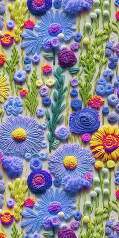 an image of colorful flowers made with crochet and thread on white paper background