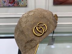 SHOP MORE LUXURY PRODUCTS HERE Description Gucci Canvas Baseball Hat Beige GG Hat Instantly recognizable emblems of the brand, logos enrich designs in new and unexpected ways. Behind every logo lies the tradition and value of the House, an everlasting medium one can wear again and again. BeigeBeige GG canvasLogo GucciAdjustable hook-and-loop closure on back Includes box, dust bag.This product is of the premium quality. Luxury Baseball Cap With Curved Brim And Logo, Luxury Hats With Logo Patch And Curved Brim, Luxury Logo Baseball Cap With Curved Brim, Luxury Baseball Cap With Logo Patch, Luxury Snapback Hat With Embroidered Logo, Luxury Adjustable Baseball Cap With Short Brim, Luxury Adjustable Brown Baseball Cap, Designer Adjustable Visor Hat, Luxury Adjustable Visor Hat