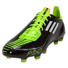 a soccer shoe with neon green and black stripes on the soles, which is also available