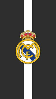 the real madrid logo on a black and white striped background