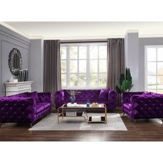 a living room filled with purple couches and chairs