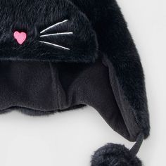 Dress your little one with the cute Girls' 3D Cat Ears Snood Hat from Cat & Jack™ in Black. Featuring adorable 3D cat ears, this hat is designed with a cozy double-layered construction for extra warmth. Made from a blend of polyester and recycled polyester, it offers a soft feel, while the knit fabric keeps it from feeling bulky. This snood hat provides full coverage with an 11-inch crown, making it a playful and functional accessory for colder days. Cat & Jack™: Designed for all children so you Black Cat Ears Hat With Cat Design, Black Hat With Cat Ears And Cat Design, Black Cat Design Hat With Cat Ears, Adjustable Warm Hat With Cat Ears, Trendy Cat Ear Hat With Cat Design, Trendy Cat Ears Hat With Cat Design, Trendy Cat Design Hat With Cat Ears, Cute Warm Cat Ears Hat, Cute Cat Ears Hat With Cat Design