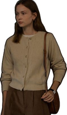 Beige Cashmere Cardigan With Button Closure, Brown Cashmere Cardigan With Buttons, Elegant Beige Sweater With Buttons, Elegant Brown Sweater With Button Closure, Beige Wool Cardigan With Button Closure, Classic Beige Sweater With Buttons, Elegant Cream Cable Knit Cardigan, Elegant Beige Cable Knit Cardigan, Elegant Cream Cable Knit Outerwear