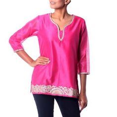 This stunning hot pink tunic is the creation of Isha Jain in India. Crafted of a cotton/silk blend the neckline and hem of the tunic feature gold and silver gota embroidery an applique-like technique that originated in Rajasthan and is traditionally used on wedding and formal garments. Gold zari embroidery sequins and sparkling faux stones add extra glamour. The semi-sheer tunic features three-quarter length sleeves and a cotton-lined bodice. Zari Embroidery, Pink Tunic, Women Artisans, Print Tunic, Design Patterns, Cotton Blouses, Cotton Silk, Bright Pink, Women Empowerment