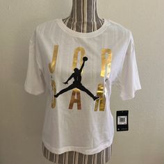 Nwt Jordan Short Sleeve Crop T-Shirt, No Rips Or Stains Offers Are Always Welcome Bundle And Save Sporty Tan Top With Graphic Print, White Graphic Tee For Sports, White Sports Shirt For Spring, White Graphic Tee Tops, Spring Sports White Shirt, White Short Sleeve Tops With Logo Print, White Short Sleeve Top With Logo Print, Air Jordan Red, Jordan Tees