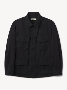 The classic Vietnam-era jungle jacket reimagined in a lightweight, lived-in cotton poplin. | Buck Mason Men's Parachute Poplin Jungle Jacket in Black, Size XS | Cotton Jefferson White, Parachute Jacket, Mens Outerwear Jacket, Buck Mason, Raw Denim, Mens Spring, Suit Shop, Mens Outerwear, Men Winter