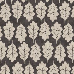 a black and white pattern with leaves on the back ground, in shades of grey