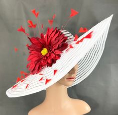 Gorgeous Kentucky Derby Hat   Ready to ship  100% Brand New  Designed & Made in USA         This gorgeous hat has a 22.5 inches interior crown circumference.The Brim is 5 3/4 inches. It fits most! Hat Base Color: White  Flower color: Red daisy with red feathers  Red color hat band This is a high quality wide brim hat with wire which could hold it's shape.It won't flop in the eyes and face. Would be great for Wedding, Bridal Shower, Tea Party, Concert,Evening Wear, Belmont,Ascot, Races, Church, A Luxury Red Hat Bands For Kentucky Derby, Classic Kentucky Derby Hat With Structured Crown, High Crown Fedora For Kentucky Derby, Kentucky Derby Structured Crown Hat For Races, Royal Ascot High Crown Costume Hats, White Hat With Structured Crown For Spring, Luxury Red Mini Hat For Kentucky Derby, Adjustable High Crown White Hat, White Adjustable High Crown Hat