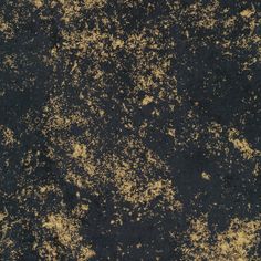 black and gold paint splattered on the ground