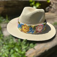 Our Fedora Straw Hat, comes with a removable hand embroidered band.  The band is embroidered by Female Artisans of the Andes in Perú.  This classic Fedora style Hat can be used in the beach and all adventures in the sun.  Perfect for travelling.    One size Bohemian Woven Hats For Kentucky Derby, Embroidered Straw Hat For Beach With Short Brim, Cream Adjustable Hat Band For Kentucky Derby, Beach Sun Hat With Embroidered Short Brim, Adjustable Beige Woven Hat Bands, Summer Embroidered Beige Hat, Festival Woven Fedora With Flat Brim, Woven Fedora With Curved Brim For Festivals, Festival Fedora With Woven Flat Brim