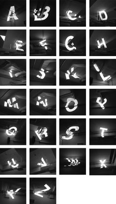 black and white photograph of alphabets with letters in the middle, from top to bottom