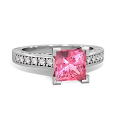 a pink princess cut diamond ring with channeled pave set diamonds around the band