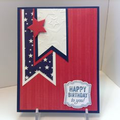 a red, white and blue birthday card with stars