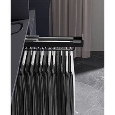 an image of a rack with clothes hanging on it