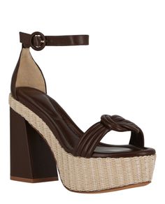 Heel height: 4.5"; Platform height: 1.6875" | Ankle buckle closure | Signature vamp strap detail | Almond toe | Ankle length, smooth finish | Specialist clean only | Upper: 50% Raffia, 50% Leather; Lower: 100% Leather | Imported Padded Heel Ankle Strap Heels For Vacation, Ankle Strap Heels With Padded Heel For Vacation, Heels With Padded Heel And Ankle Strap For Vacation, Leather Ankle Strap Heels For Vacation, High Heel Sandals With Buckle Closure For Vacation, Brown Ankle Strap Heels With Strap Detail, Vacation Heels With Ankle Strap, Ankle Strap Heels For Vacation, Brown Strap Block Heels