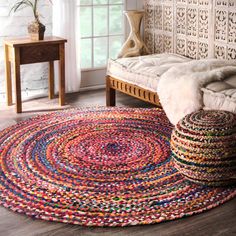 a living room filled with furniture and rugs