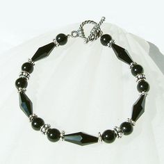 Black Vintage Swarovski Crystal Onyx Sterling Silver Bracelet NEW For Work Everyday Birthday Gift Elegant Round Crystal Bracelet With Gemstone Beads, Classic Onyx Jewelry For Party, Elegant Adjustable Onyx Crystal Bracelet, Elegant Gemstone Beaded Bracelets For Anniversary, Elegant Faceted Crystal Bracelet For Gift, Elegant Onyx Crystal Bracelet Adjustable, Elegant Beaded Bracelets With Lobster Clasp For Gifts, Elegant Beaded Bracelets With Lobster Clasp As Gift, Elegant Faceted Bracelets For Anniversary