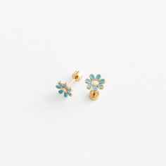 Add a touch of charm to your wardrobe with The Blue Daisy! These delicate beauties feature enchanting blue daisies in full bloom, with a 18k gold trim. The stunning blue petals are beautifully contrasted against the gleaming gold, creating a magical, eye-catching effect. Blue Flower Earrings For Spring, Light Blue Flower Jewelry For Spring, Blue Flower-shaped Spring Jewelry, Delicate Blue Flower Earrings, Elegant Blue Birth Flower Earrings, Blue 3d Flowers Earrings, Gold Daisy Flower Earrings As Gift, Blue 3d Flower Earrings As Gift, Blue 3d Flower Earrings For Gift