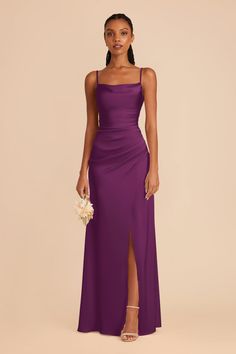 a woman in a long purple dress