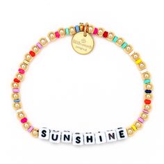 Always bring your own sunshine! - *Disc Colors May Vary*Hand-crafted, beaded braceletGold-plated brass hardwareElastic stretch braceletHandle with Care - do not wet Summer Friendship Gold Bracelets, Gold Bracelets For Friendship And Summer, Gold Bracelets For Friendship In Summer, Summer Gold Bracelets With Letter Beads, Summer Gold Bracelet With Letter Beads, Gold Bracelet With Letter Beads For Summer, Summer Everyday Hand-strung Jewelry, Hand-strung Gold Jewelry For Summer, Summer Gold Beaded Bracelets With Letter Beads