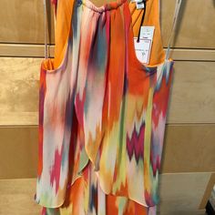 Brightly Colored Sheer Overlay Dress With Hardware At Neckline And Back Tie Closure(Halter Style) Perfect For A Destination Wedding! Yellow Lined Maxi Dress For Summer, Orange Spring Dress With Colorful Pattern, Spring Orange Dresses With Colorful Pattern, Orange Dresses With Colorful Pattern For Spring, Orange Dress With Colorful Pattern For Spring, Flowy Sleeveless Dress In Multicolor Print, Flowy Multicolor Print Sleeveless Dress, Flowy Multicolor Sleeveless Dress, Yellow Sleeveless Lined Maxi Dress