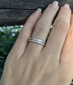 "A two tier half-eternity band featuring pave-set genuine sparkling shimmering White Topaz is a unique women's wedding band or April birthstone ring. Wrapped in a box ready for gift-giving. (r-egt-101) Size 5 ---> Don't know your ring size? Purchase our ring sizing gauge https://www.etsy.com/listing/290720637/ring-sizer-ring-sizing-gauge-multisizer?ga_search_query=ring+sizer&ref=shop_items_search_1 *Follow us @instagram for promotions *LIKE* us on Facebook http://www.facebook.com/Belesas Stackable Double Band Diamond Promise Ring, Stackable Double Band Diamond Ring For Wedding, Stackable Double Band Diamond Wedding Ring, Diamond Stackable Eternity Band For Promise, Double Band Stackable Diamond Wedding Ring, Anniversary Stackable Rings With Pave Setting, Adjustable Half Eternity Diamond Band, Diamond White Stackable Eternity Band For Promise, Double Band Stackable Diamond Anniversary Ring