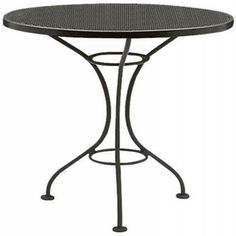 an outdoor table that is black and has a round top with metal legs, on a white background