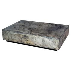 an old stone box sitting on top of a white background