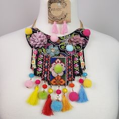 Boho Chic Statement Necklace & Tassel Earrings. Multicolored, Embroidered, Pompom & Tassel Details. Ethnic Vibes With Fun Colors! Make A Statement With A Simple Tee Or Summer Dress. N3 Bohemian Tassel Earrings For Party, Bohemian Embroidered Party Jewelry, Multicolor Embroidered Bohemian Necklaces, Multicolor Embroidered Bohemian Necklace, Multicolor Bohemian Embroidered Necklace, Multicolor Embroidered Jewelry For Festivals, Traditional Multicolor Tassel Jewelry, Festive Multicolor Embroidered Jewelry, Multicolor Tassel Earrings For Festival