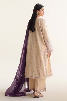 Brand: Zara ShahjahanProduct Code: D-05B DINARACollection: Coco by Zara Shahjahan Vol-02 Unstitched Lawn CollectionFabric: Lawn DESCRIPTION: Summer’s epitome of chic awaits in this stunning jacquard ensemble. Luxurious floral embroidery in vibrant beige and purple dances across the graceful shirt, perfectly paired with an embellished dupatta and cambric pants. It’s a masterpiece of timeless allure. DESIGN DETAILS: Dyed Dupatta 2.65 Yards Embroidered Organza Dupatta Border 8.6 Yards Embroidered Organza Dupatta Border 2.6 Yards Embroidered Dyed Self jacquard Front 0.7 Yards Embroidered Dyed Self jacquard Back 0.7 Yards Embroidered Dyed Self jacquard Panel 0.7 Yards Embroidered Dyed Self jacquard Sleeves 1.6 Yards Embroidered Organza Border 2.5 Yards Embroidered Organza Border 1 Yards Embroid Luxury Zara Pants For Women, Luxury Women's Zara Suits, Zara Chic Luxury Suits, Chic Luxury Zara Dresses, Luxury Beige Dupatta With Floral Embroidery, Luxury Summer Lawn Suit In Purple, Luxury Embellished Zara Dresses, Luxury Chic Zara Dress, Luxury Floral Embroidered Unstitched Suit For Summer