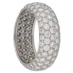 Vintage Tiffany & Co. five row diamond ring. Set with one hundred and forty five round brilliant cut diamonds in open back grain settings with a combined approximate weight of 4.35 carats, to a smoothly conforming bombé shape band, set throughout with five rows of diamonds, graduating in size, with intricate pierced lattice backholing, approximately 7.5mm in width. Marked platinum, signed 'TIFFANY & CO.', American, circa 1970, accompanied by Tiffany & Co. box. UK finger size N. Please note ship Art Deco Sapphire Engagement Ring, Diamond Aesthetic, Vintage Platinum Rings, Royal Diamond, Sapphire And Diamond Band, Tourmaline Engagement Ring, Diamond Cluster Engagement Ring, Vintage Tiffany, Gold Gemstone Ring